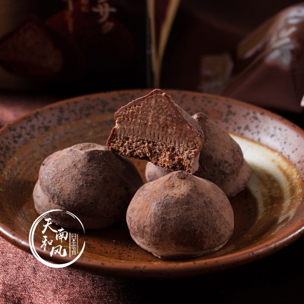 日本进口Meiji明治牛奶巧克力儿童礼物糖果零食送女友亲人可可夹心松露巧克力49g