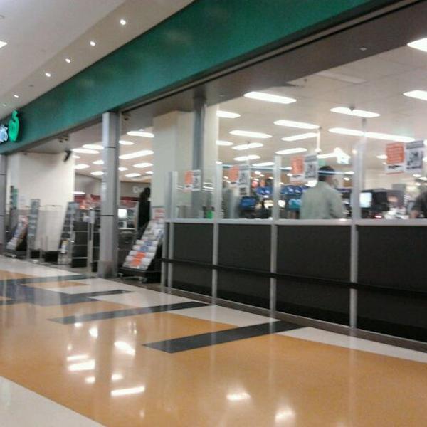 Photo taken at Woolworths by Karina L. on 11/4/2011