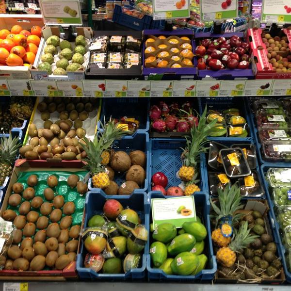 Photo taken at Proxy Delhaize by Tanguy V. on 12/24/2012