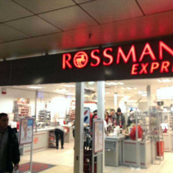 Photo taken at Rossmann Express by Paul B. on 2/1/2014