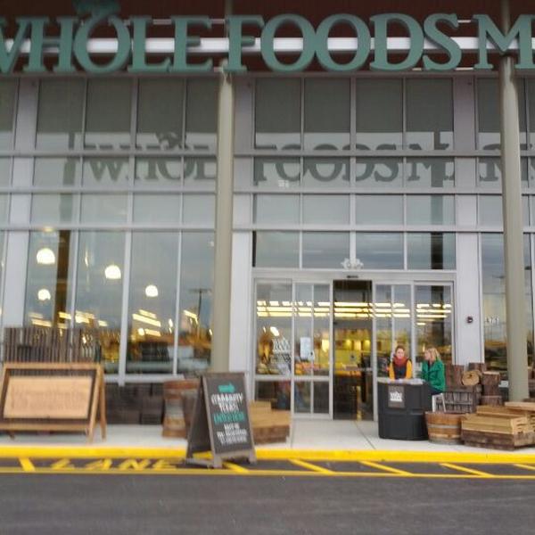 Photo taken at Whole Foods Market by Eric L. on 3/12/2012