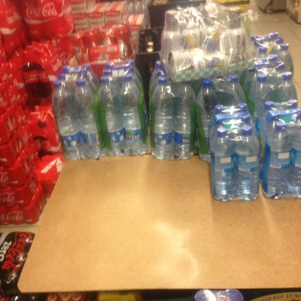 Photo taken at Proxy Delhaize by Sigourney V. on 8/1/2013