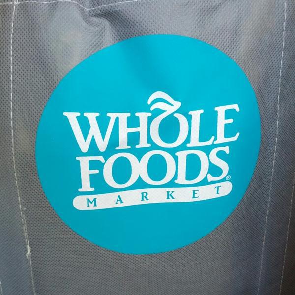 Photo taken at Whole Foods Market by KC K. on 9/25/2013