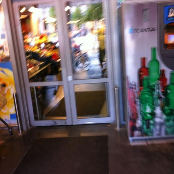 Photo taken at Proxy Delhaize by fb.com/DjKRStF K. on 5/9/2012