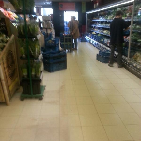 Photo taken at Proxy Delhaize by Jeremy V. on 3/8/2014