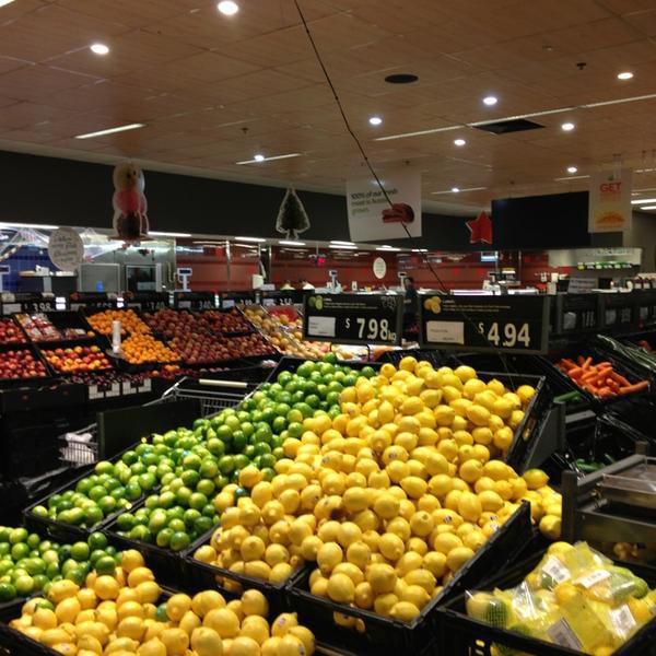 Photo taken at Woolworths by Tony L. on 12/24/2012