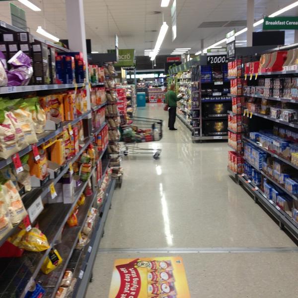 Photo taken at Woolworths by Peter M. on 8/23/2013