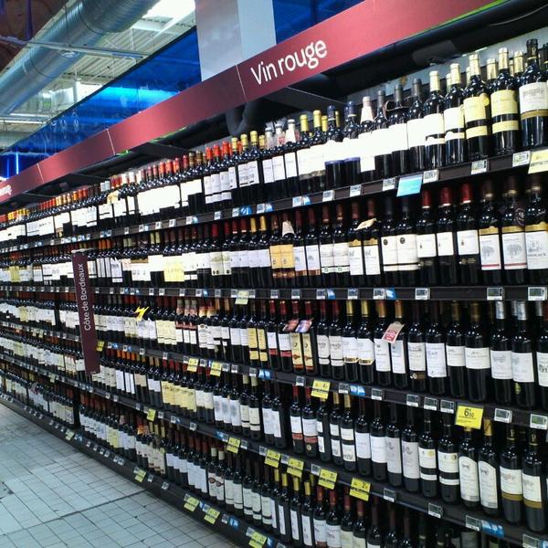 Photo taken at Carrefour by Kana M. on 2/18/2013