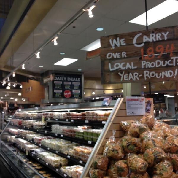 Photo taken at Whole Foods Market by Rebecca P. on 8/1/2012