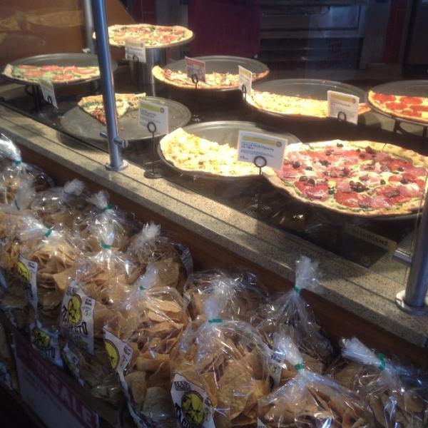 Photo taken at Whole Foods Market by Kim S. on 12/23/2012