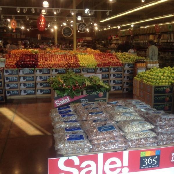 Photo taken at Whole Foods Market by Kim S. on 12/23/2012