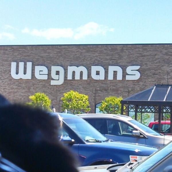 Photo taken at Wegmans by Rebecca G. on 7/25/2013
