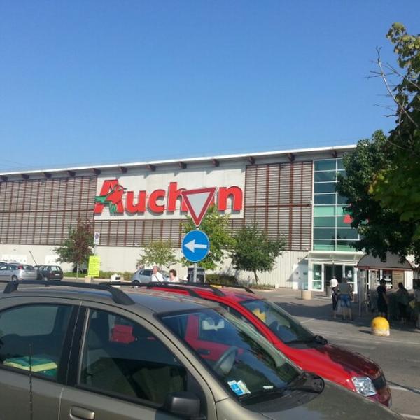 Photo taken at Centro Commerciale Auchan by Paolo on 8/18/2012
