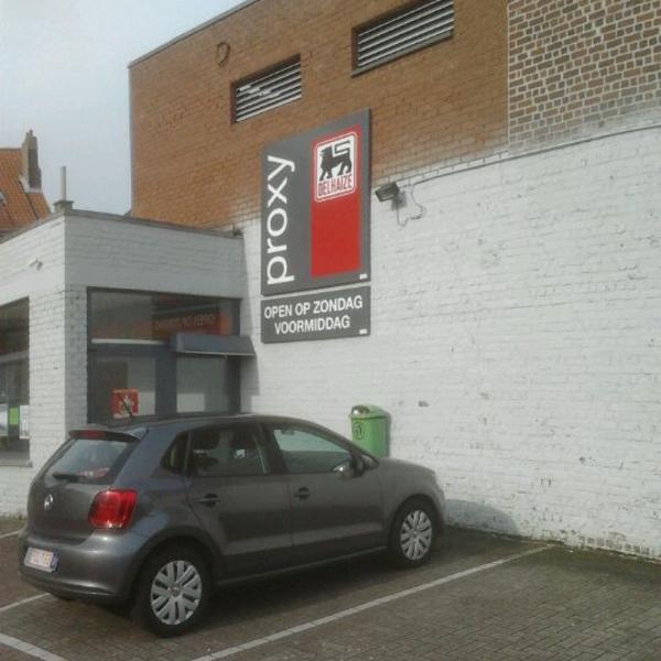 Photo taken at Proxy Delhaize by Jo V. on 4/12/2012