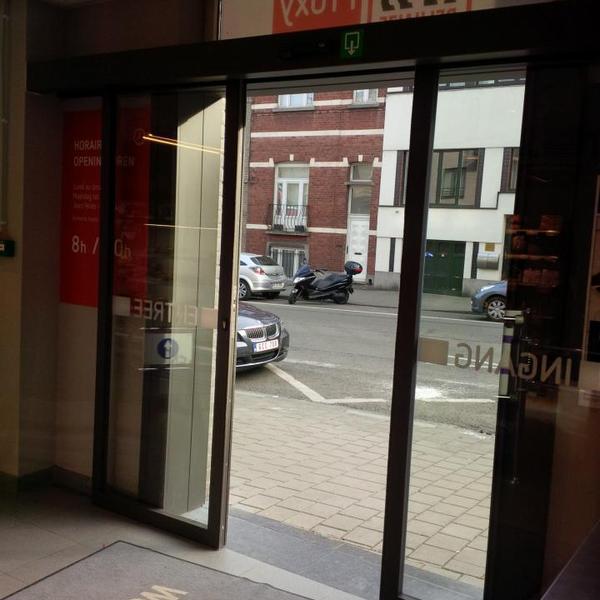 Photo taken at Proxy Delhaize by Emi L. on 4/2/2014