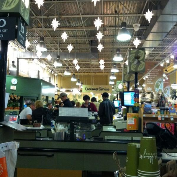 Photo taken at Whole Foods Market by Maura M. on 12/5/2011