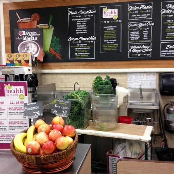 Photo taken at Whole Foods Market by Dress for the Date on 2/7/2013