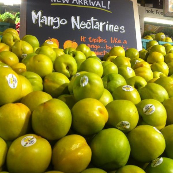 Photo taken at Whole Foods Market by Jude T. on 7/12/2012