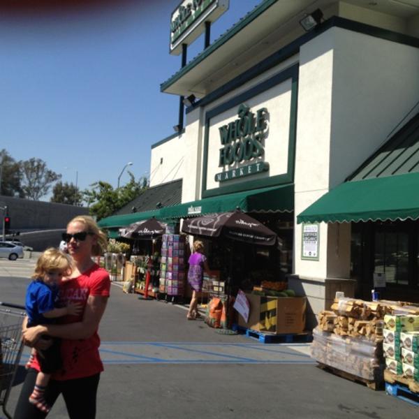 Photo taken at Whole Foods Market by K B. on 4/18/2012
