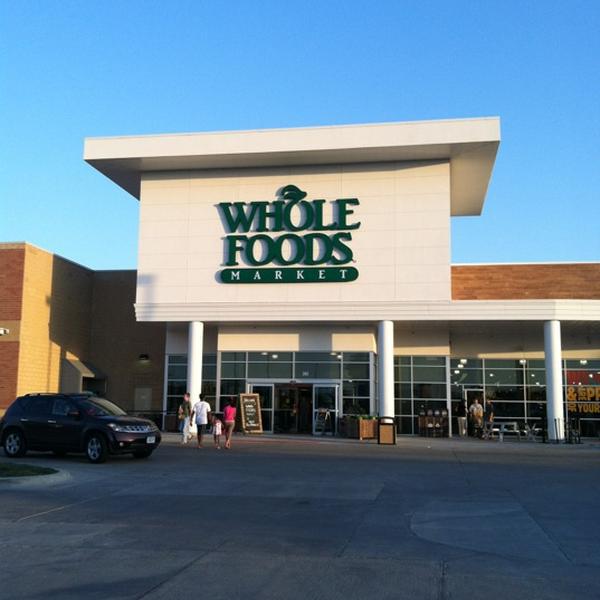 Photo taken at Whole Foods Market by Kate R. on 7/19/2012