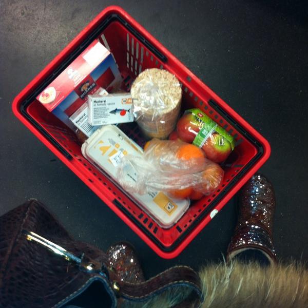 Photo taken at Proxy Delhaize by María K. on 11/25/2013