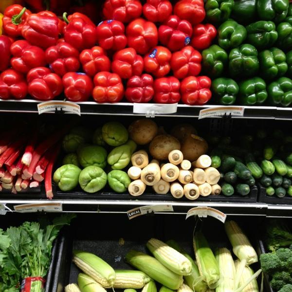 Photo taken at Whole Foods Market by Dress for the Date on 2/3/2013