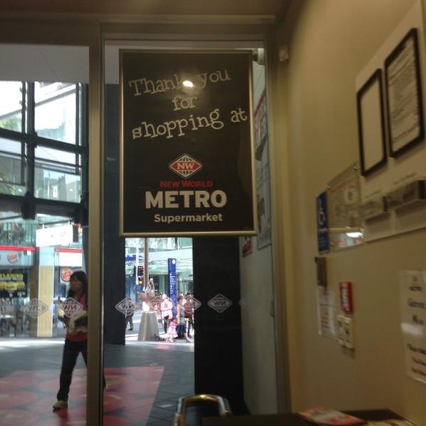 Photo taken at New World Metro by Cameron M. on 12/1/2012