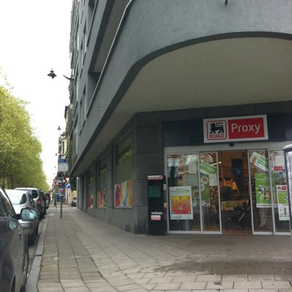 Photo taken at Proxy Delhaize by Mina on 5/5/2012