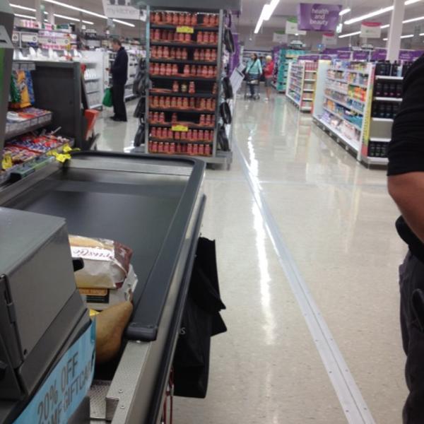 Photo taken at Woolworths by Andrew B. on 4/1/2012