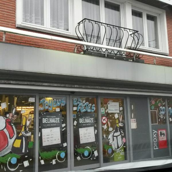 Photo taken at Proxy Delhaize by Sergio S. on 12/22/2013