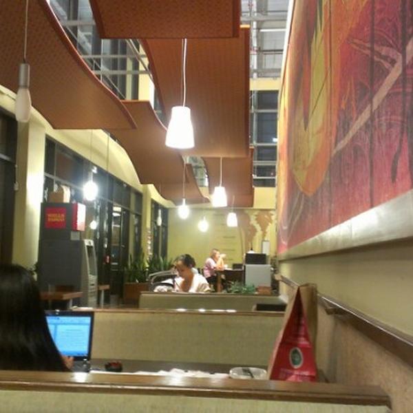 Photo taken at Whole Foods Market by Dino C. on 12/7/2012