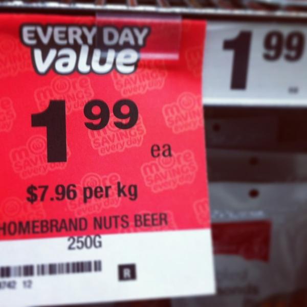 Photo taken at Woolworths by Ozan T. on 8/1/2013