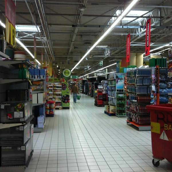 Photo taken at Carrefour by Benoit M. on 7/19/2012