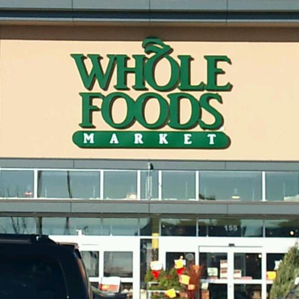 Photo taken at Whole Foods Market by Brian R. on 12/24/2011