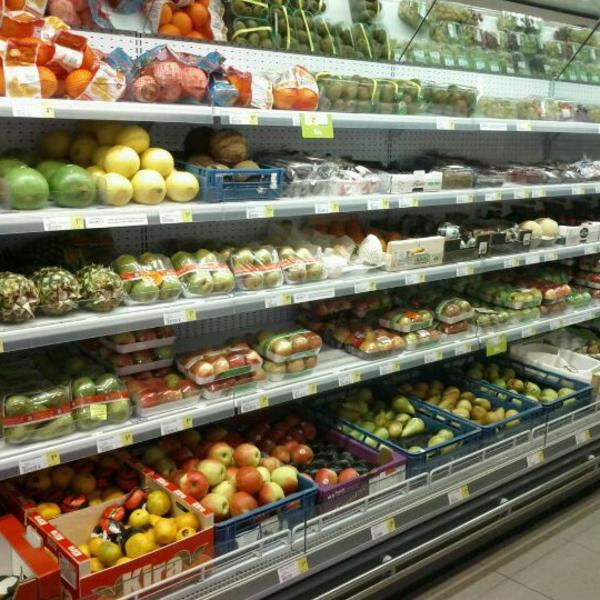 Photo taken at Proxy Delhaize by Tim V. on 11/3/2011