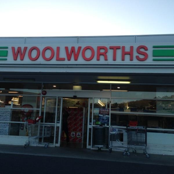 Photo taken at Woolworths by Mia G. on 12/6/2012
