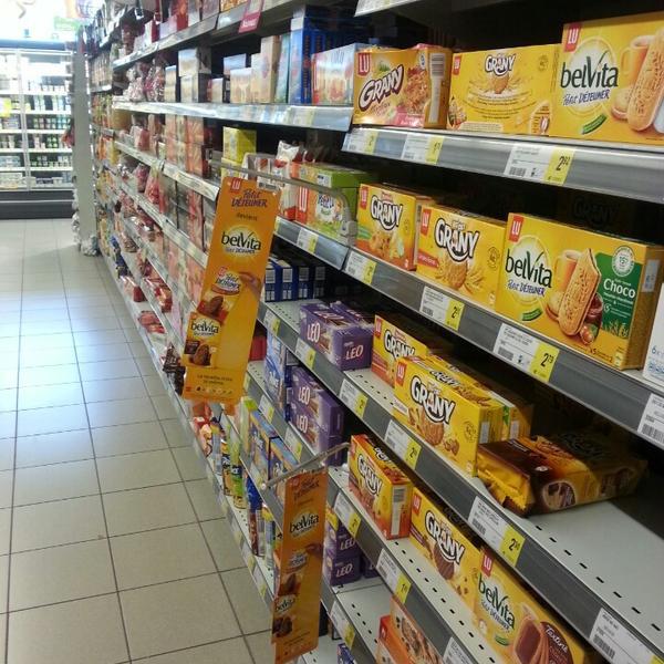 Photo taken at Proxy Delhaize by Marc V. on 8/19/2013