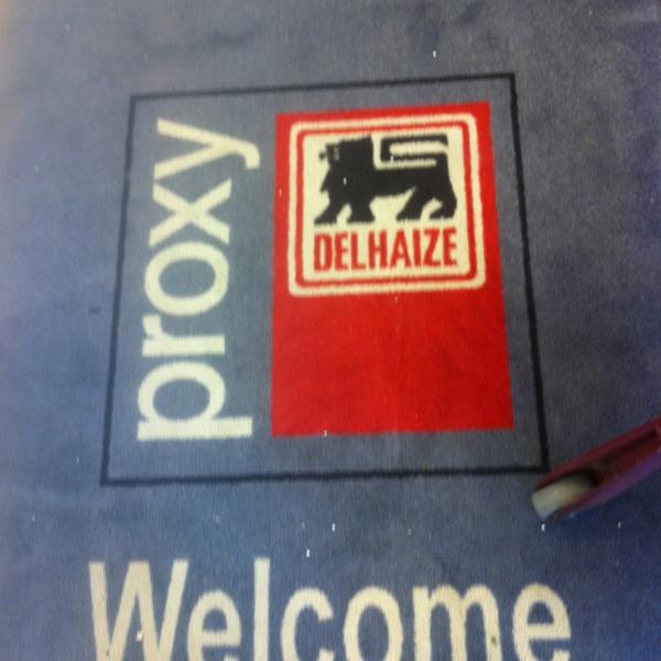 Photo taken at Proxy Delhaize by Karel D. on 3/5/2013