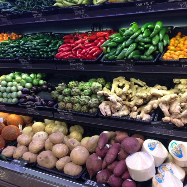 Photo taken at Whole Foods Market by spike k. on 12/18/2012