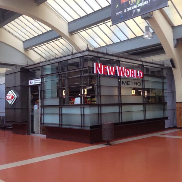 Photo taken at New World Metro by Darren D. on 12/28/2013