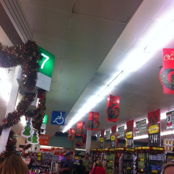 Photo taken at Woolworths by Heather B. on 12/3/2011