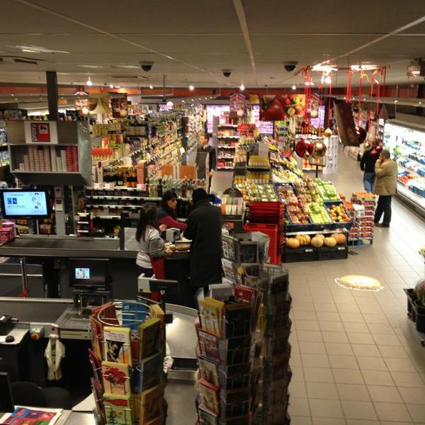 Photo taken at Proxy Delhaize by Gilles V. on 12/28/2012