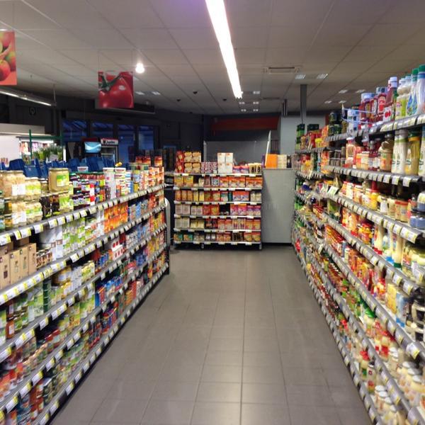 Photo taken at Proxy Delhaize by Tanguy V. on 1/9/2013