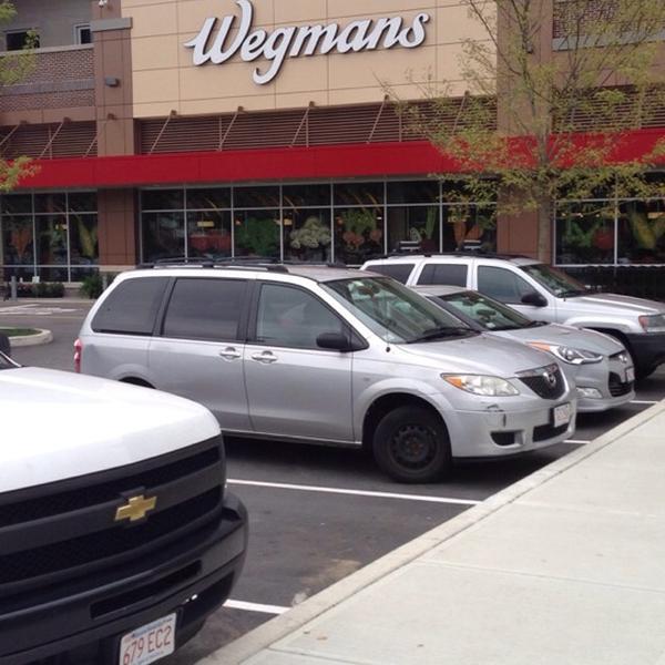 Photo taken at Wegmans by Sarah G. on 7/20/2014