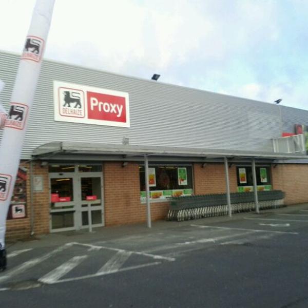 Photo taken at Proxy Delhaize by Sam D. on 1/29/2012