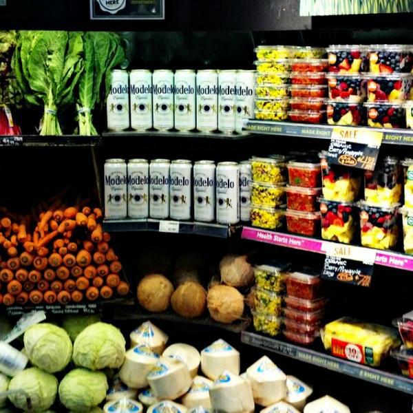 Photo taken at Whole Foods Market by Kate K. on 7/16/2013