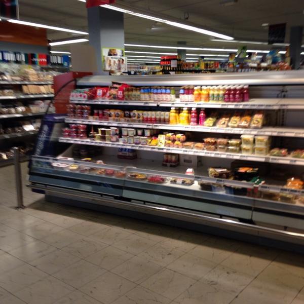 Photo taken at Proxy Delhaize by David d. on 6/21/2014