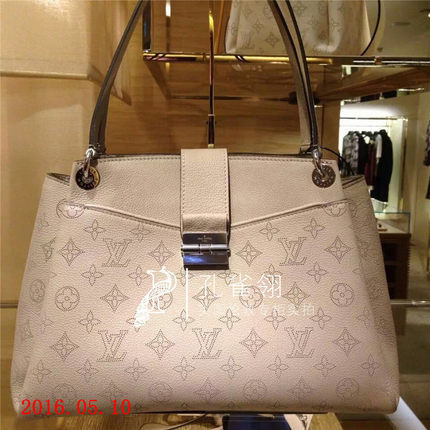 Louis Vuitton路易威登lv女包16新款镂孔平纹小牛皮手提包M41789 Louis Vuitton路易威登lv女包16新款镂孔平纹小牛皮手提包M41789