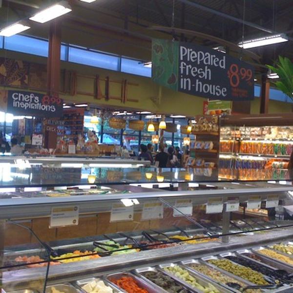 Photo taken at Whole Foods Market by Malia H. on 12/31/2010