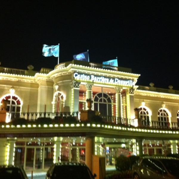Photo taken at Casino Barrière de Deauville by Romario on 7/17/2012